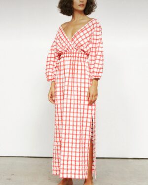 Jasika Nicole Instagram - Savage calls this dress 🎶GinghnamStyle🎶 and I am calling it 🥒 The Pickle Dress🥒- both are pretty accurate! I was inspired by a checked Mara Hoffman wrap dress that floated across my Pinterest once and couldn’t get out of my head. I planned on hacking several different patterns together to make it but luckily a fellow instagrammer reached out to show me McCalls 8035 which would be a way closer twin to the Mara Hoffman garment with only a few tweaks. I ended up using the bodice sleeves of the Elodie dress by @closetcorepatterns instead of the set in sleeves of the McCalls because I ❤️adore❤️ that subtle little shoulder peeking out and I knew I could achieve this best with a grown on sleeve. I also adjusted the back bodice piece to have a V-neck line at the back to give the sleeve more space to dip off the shoulder. I changed the waistline of the bodice and skirt to accommodate a wider piece of elastic like the inspo dress (I used 1.5” wide elastic), zigzagged across the elasticized waistband to make it more stable, added some elastic to the sleeve hems and finally I stuck a bra strap holder to the shoulder seam so that when I wore it off my shoulder my bra strap wouldn’t try and creep into frame. My sleeves have slightly more drama and the skirt is a touch more billowy than the inspo but all in all I think I nailed this hack. It includes all the markers of what I initially loved about the inspo dress- a fun graphic print ✅ in a color I love ✅ in linen, a fabric I love (this gingham is gifted from @wearethefabricstore and is very excellent) ✅, with a romantic, flowy silhouette ✅ that looks great with this hair length lol ✅ I tried to recreate the inspo photo in front of our white garage door but it was so bright outside that the pics came out grainy- hopefully the vibes still translate 💚