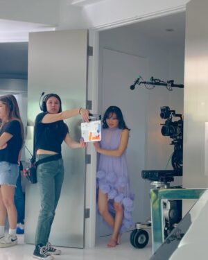 Jeannie Elise Mai Instagram - That’s a wrap on my dream role 🥹🎬 it me, Baby 💟 g-wagon drivin, pill poppin Malibu baddie💋

(ﾉ◕ヮ◕)ﾉ*:･ﾟ✧
Directed by @sammcoppola 
DP @idanmenin 
Hair & make up @nattylanz_makeup 
Costume designer @rachellemoser