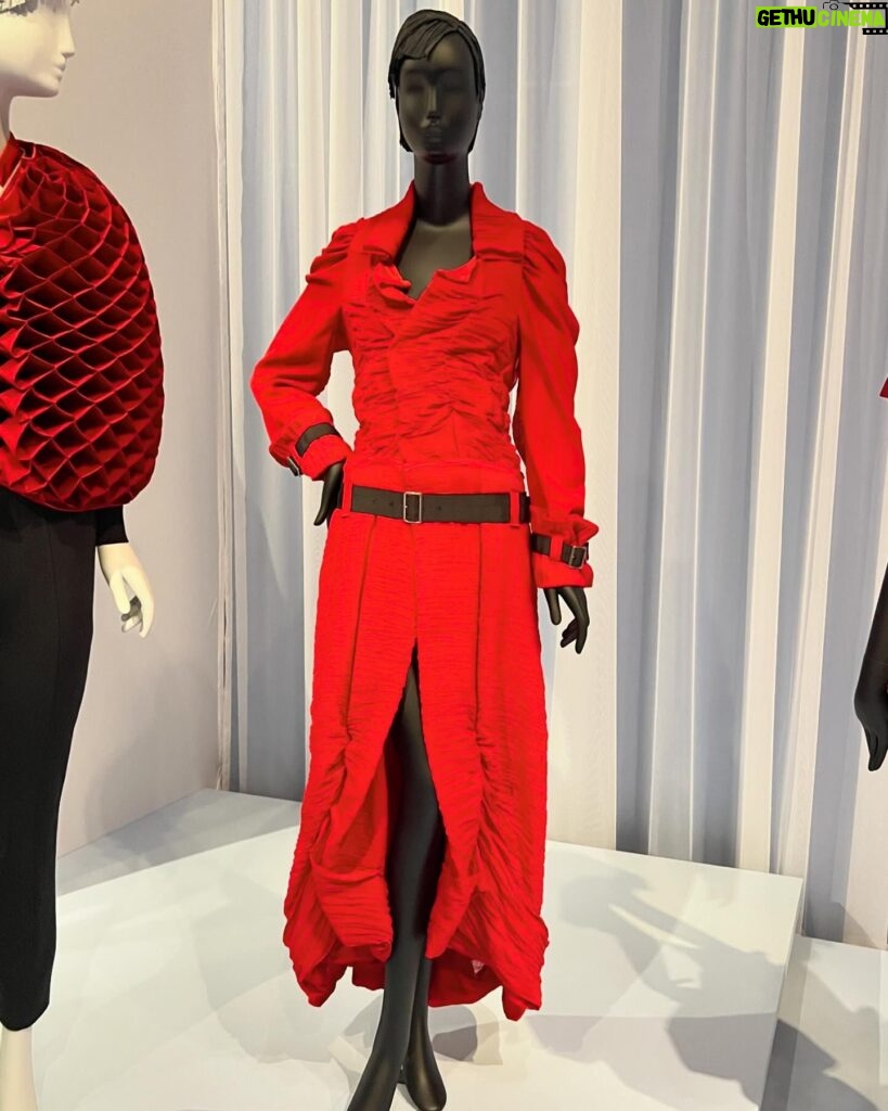 Jen Gunter Instagram - We went to the “Fashioning San Francisco” exhibit at the @deyoungmuseum and here are some of my favorite outfits. The first two images are the Junon dress (Dior), and it is breathtaking. I also loved the red, pirate-esque dress, which I think was Comme des Garçons and the tea length black dress with the stunning pleats (also a Dior). I was left feeling a bit like Mrs. Harris…oh to have a Dior gown. The skills required to produce some (likely all) of these outfits are something to behold. For the purple pleated dress at the end it took 7 yards of fabric to make one yard of pleated fabric! The shoe exhibit was a disappointment. Maybe 9 or 10 pairs of shoes! Sigh.