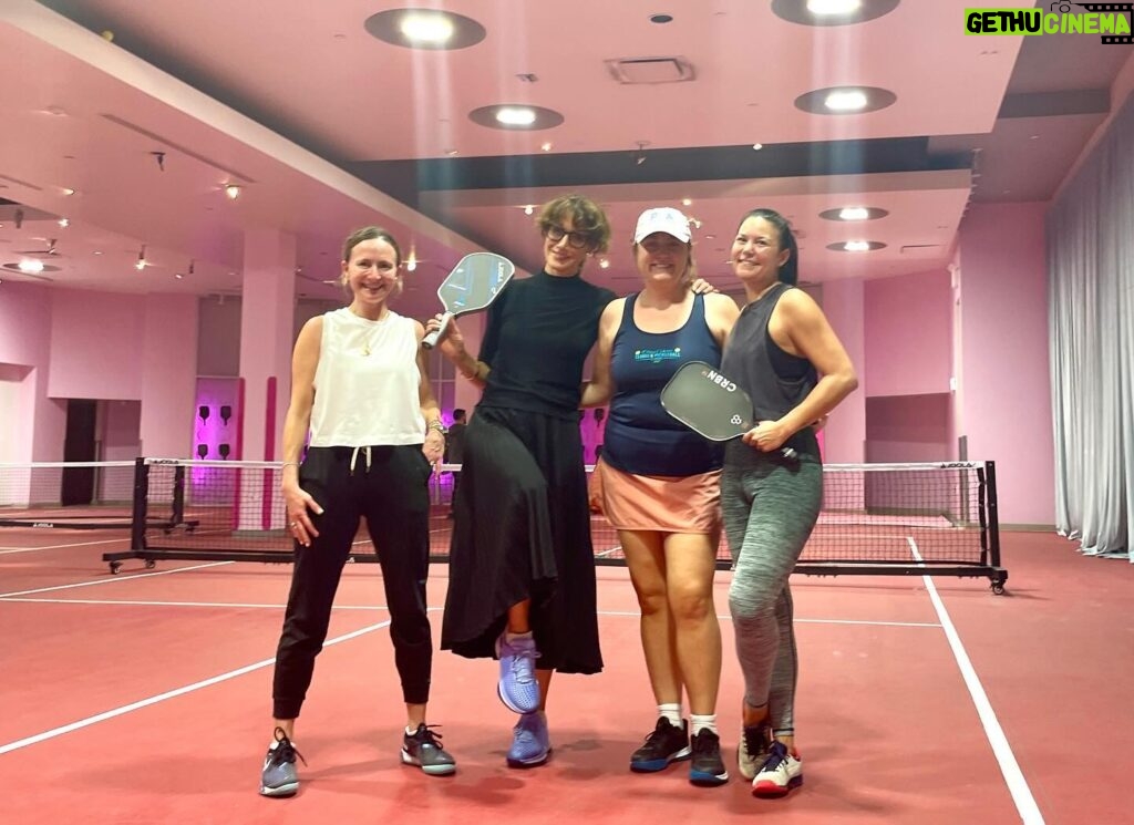 Jennifer Beals Instagram - ….so this is how I feel when I go check out an indoor pickleball facility in the middle of a workday dressed in a maxi wool skirt and turtleneck and the kind person showing us around invites my friend to play because she is wisely dressed in sweatpants and sneakers, and I get so envious that I pull my knee-high boots off and SWEAR I can play barefoot and then this very same nice person procures the perfect pair of @skechers at the perfect size 8 1/2 for me to wear along with my maxi wool skirt and then I take off my bangles and dangly earrings and we get to drill for an HOUR with the future Santa Monica Open 4.0 champs which also explains my flamingo pose in the group shot. Yes. I am addicted to pickleball. Thank you Jen and @janehollon for your generosity and wisdom! #pickleball