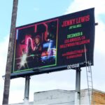 Jenny Lewis Instagram - the JOY’ALL BALL rolls on tomorrow at the @hollywoodpalladium w @shabazzpalaces & @loganledger there are still a few tix avails ! omg i’m on a motorcycle on a friggin billboard in LA! 📸 by @mamahotdog we out here having a ball y’all. not only did i get my hair did by @jayne_edosalon in Jerry’s dressing room @thewarfield but i sat in the @prince chair @roselandpdx we visited the amazing @madonnainn1958 & two in our traveling party got ass tats i hung w @deanjohnsongs who put out a gorgeous record this year @sinagrace made this poster after seeing us @venturamusichall we’ll have a limited run at the @hollywoodpalladium the @dwcweb will be there as well with information on how to help out! if you want to bring a christmas ornament for the red stage tree they are welcomed ! you can leave em at merch if you want to help decorate! we’ll have some old merch designs as well in the shop and a limited edition JOY’ALL jewelry line by @makerandsmith well, what else can i say but it’s almost christmas! best, JL & @bobbyrhubarblewis