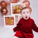 Jessi Smiles Instagram - Swipe to see what happens when you try to get your baby to smash a cake past their bed time 🤣 my queenie is 1 year old today! The feeling in my heart is so hard to describe. There’s a certain heaviness that comes with watching your last baby grow out of being a baby. My friend once told me that they stop smelling like babies once they turn 1. I never believed her until it happened to Noah. That baby smell left and he became a big kid before I knew it…so I find myself just smelling her head and wanting time to freeze so desperately. I love my babies so much. And although they’ll always be my babies, they won’t always be babies. My heart is both broken and overjoyed in understanding that. Parenthood is a mess lmao. But happy birthday, Amélie. You have truly completed our family. You are such a strong and beautiful soul and I’m grateful to be your mommy. 💛