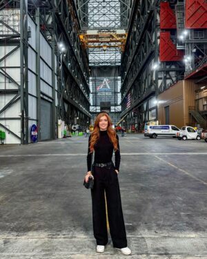 Jessica Gagen Instagram - Yesterday I visited NASA’s iconic VAB!

The VAB (Vehicle Assembly Building) was completed in 1966 and has since processed 12 Apollo missions, 4 Skylab missions, 1 Apollo-Soyuz project, 1 Ares 1 mission, Artemis 1 and all 135 Space Shuttle missions!

Quick facts about the VAB:

🚀 At 3,684,883 cubic meters, it is one of the largest buildings in the world by volume!

🚀 The American flag painted on the building is 209ft tall and 110ft wide - each star is 6ft across!

🚀 The building is made of 65,000 cubic yards of concrete and its frame contains 98,590 tons of steel!

Massive thank you to the team at @boeing for organising my visit - granting a foreign national access to this incredible piece of engineering doesn’t come easy! I’m mesmerised 🤩✨

#nasa #vab #stem #missengland #rocketscience #rocketscientist #aerospaceengineer #engineer #engineering #science #astro #avgeek #spacegeek #florida #capecanaveral #redhead #space #rocket #artemis