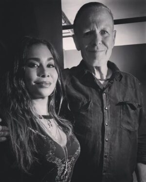 Jessica Pimentel Instagram - Me and the incomparable wizard, Brujo of all brujos, Michael Gira of @swans_official in Brooklyn a few days ago. What an honor finally seeing them again since 2015. 
I'm not sure my ears have fully recovered. My soul definitely hasn't. I was pretty sure that balcony was going to fall a few times from the sheer power and vibration, intensity and volume of the show. Bravo to you and the whole band. Also lovely seeing my old time friend Chris Pravdica leave it all on the stage as usual. Bravo!! 
Thank you to my wonderful friend @michaelanthonyalago for the experience, the company and the photo, which I was too shy to ask for. 
💀🖤🦢🖤🦢🖤💀
#swans #michaelgira #earplugs
