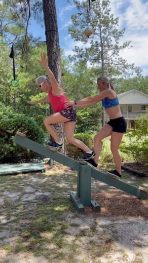 Jessie Graff Instagram - Finding that work/life balance with mom @ginnymaccoll . Thanks @charlesmammay for letting us play on your course!
#balancetraining #stabilitytraining #motherdaughter #seesaw