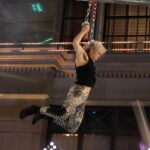 Jessie Graff Instagram – So grateful to be back competing on @ninjawarrior ! And this time, with my mom @ginnymaccoll !!! 
If you haven’t seen last week’s episode yet, spoiler alerts! Go catch up now!
Win: this was the first time I’ve made it to the 5th obstacle without feeling even a little pumped!  My grip was so fresh and ready!
Room for growth: I had a unique strategy that no one else had tried, which had the potential to save me time and energy.  Rather than hold a left hand lockoff, while trying to turn the cube with the thin ledges on the front side, i planned to swing forward and grab any one of the three large jugs on the right side of the cube.  My big mistake was not choosing which one to reach for and aiming precisely.  I swatted between two jugs and missed both.  If i had thought about how (nearly) impossible it would be for me to hold on to a slippery plastic flat ledge on a one armed back swing, i might not have chosen to take that risk.  So in hind sight, I do wish I’d taken the more standard path.  But i had so much fun strategizing for this obstacle, and wish i could try it again!  Thank you so much #americanninjawarrior for another opportunity to solve puzzles and test my limits! I definitely grew stronger and smarter through this challenge!
