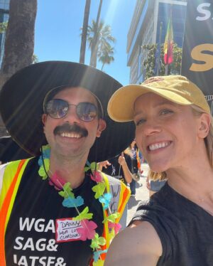 Jessy Schram Instagram - Making Hollywood honk. Day 1 of @sagaftra strikes. Joining the #WGA on their day 74. 
.
Parrots on the picket. Running into friends, costars and writers from now and and way back when. We don’t want to be striking- but absolutely have to. I’ve been a SAG member since 1997. I’ve always felt the protection of my union and feel lucky and proud that it continues to fight to protect me and 159,000  entertainers, to continue making chasing dreams and making a living- safely, financially and respectfully- in this world we call show business.