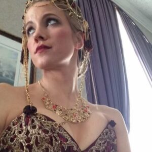 Jessy Schram Instagram - #TB to #LizzieBordenChronicles 🪓🩸First day on set called for a belly dance in a corset while chopping off a paper machete head with red streamers spurting from a dummy’s body. The cast and costumes on this were 🔥🔥and I so very appreciate having played Miss O’keefe.