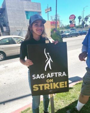 Jessy Schram Instagram - Making Hollywood honk. Day 1 of @sagaftra strikes. Joining the #WGA on their day 74. 
.
Parrots on the picket. Running into friends, costars and writers from now and and way back when. We don’t want to be striking- but absolutely have to. I’ve been a SAG member since 1997. I’ve always felt the protection of my union and feel lucky and proud that it continues to fight to protect me and 159,000  entertainers, to continue making chasing dreams and making a living- safely, financially and respectfully- in this world we call show business.