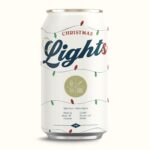 Jewel Staite Instagram - ALL LIT UP // Light up your holiday season with Four Winds Christmas Lights, because nothing says holiday cheer like a light lager dressed fancier than your neighbour’s over-the-top Christmas display. Head down to the taproom and pick up a 6 pack before these festive sips vanish quicker than Grandma’s butter tarts on Christmas eve! #fourwindsbrewing #FWlight #lager #christmaslights #alllitup #taproomexclusive