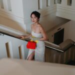 Joanne Peh Instagram - Going on an adventure with #FendiPeekaboo. Ever notice how, as we get older, we kind of hesitate more before diving into something new? There’s this thing about our brains — apparently, the part that’s all about making decisions, weighing the ‘is this worth it?’ stuff, gets a bit less sparky with age. Think about it — why do we say no to new adventures? Here’s how I keep flipping the script on that: Stay curious. Always. Peek around corners, open those mystery doors. What’s the worst that can happen, really? Embracing a little bit of ‘what if’ with a whole lot of courage — that’s my fountain of youth. Keeping it playful with a dash of #Fendi charm. @fendi