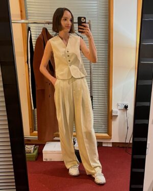 Jodi Balfour Instagram - it’s also gonna be about the outfits, ok. mini horsebit perfect for holding chips, two-of-three-piece suiting dreams and twinkling sneakers so brazen that she’d remember. serving more, much more, as we go. #tedlasso @appletv