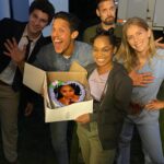 Jordan Claire Robbins Instagram - A throwback to the time when, delirious and sleep deprived in the middle of a cornfield, @theorossi and I came up with the genius idea to prank @tahirah_sharif by convincing the entire crew it was her birthday and forcing her to endure the always awkward birthday song and cake 🎂😬 yes we are children, no I don’t regret it, and yes it is, to this date, one of my proudest life moments…happy birthday Tahirah, sorry we broke your trust. #sorrynotsorry #escapethefieldmovie #tbt
