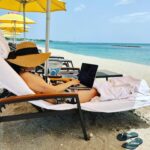 Judy Joo Instagram - “Life’s a beach!” And when you work for yourself you are always multitasking! Get the emails out and then jump in the ocean and play! Love it when you have full wifi on the beach… the @fsnevis @fourseasons makes work and play so easy! . . #nevisnice #nevisnaturally #fsnevis @nevissuntours @fionasims #workandplay #vacation #luxurylifestyle #luxury #luxuryvacation #chefs #chefslife #caribbean