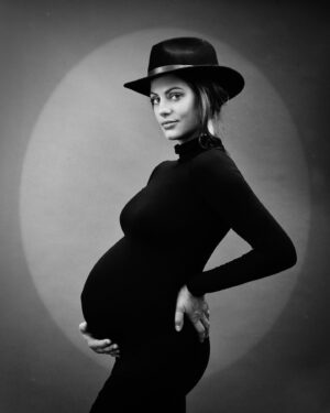 Julia Voth Instagram - I definitely didn’t have a typical pregnancy experience having lived most of it in lockdown. It felt more like a strange time warp where everything stopped except my growing belly. In an unprecedented time when the world slowed down to an almost screeching halt and stayed 6 feet away from everyone, we as a whole were forced to follow suite. I missed out on typical normal life pregnancy experiences. Things that in the old world I would have absolutely took for granted. But what I got in return was the precious gift of time. Time to really focus on myself, my health and most importantly our baby. To educate myself on how I can best support her through every week she’s inside me and beyond. I truly feel lucky that I have been able to focus my energy on her and give her the best possible start that I can. This only made possible by the support of the best soon-to-be daddy @dzonshine who’s love and dedication to our family makes me confident there is no hurdle we can’t overcome. Together we were determined to make something incredible out of this bizarre time we are living in so that one day, when we are telling her about her birth story, she will know that growth and expansion can happen even in the darkest of times. 
.
.
We are in the home stretch my little one and I can’t wait to meet the beautiful little girl who has already given us so much ❤️
.
.
Photo credit to my insanely talented friend @tessaangus who figured out how to give me the outdoor social distanced maternity shoot of my dreams. More pics to come ❤️
.
.
#ninemonthspregnant #abouttopop #maternityshoot #blackandwhite