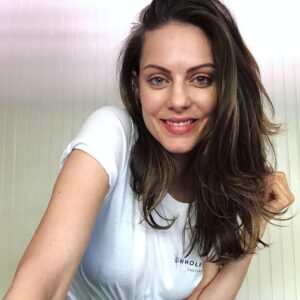 Julia Voth Instagram - Tips for a happy healthy summer! Drink lots of water, wear sunscreen, and be grateful that everyday feels like #Friyay! Wearing my ethically made WRAP-certified @wholesomeculture tee. Find yours by following the link in my bio. I’m so happy to be working with a company that is eco aware. They give 10% of their profits to animal rescue and environmental organizations and use only water based ink #tgif @wholesomeculture #ecofashion #ecoaware #conciousfashion #wholesomeculture