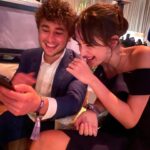 Julia Butters Instagram - At 13 years old, @julia_butters (Julia Butters) has already acted in two best picture-nominated films. Here’s #10Things with “The Fabelmans” actress ahead of the 95th Annual Academy Awards. ❤️ ⁣ ⁣ 1. All dressed up (with somewhere fabulous to go) on a night out in Hollywood. ⁣ 2. A very proud brow moment.⁣ 3. Julia’s must-have movie snacks. 🍿⁣ 4. Quick fit check. ⁣ 5. Bestie @mckennagraceful (Mckenna Grace) hyping Julia up.👯‍♀️⁣ 6. Waiting on the chauffeur (aka dad).⁣ 7. Is there a better 1? (Also dad.)⁣ 8. “I love you” texts.⁣ 9. A surprise on Sunset Boulevard. 🌇💫⁣ 10. Reunited (with a “The Fabelmans” cast member!) and it feels so good.