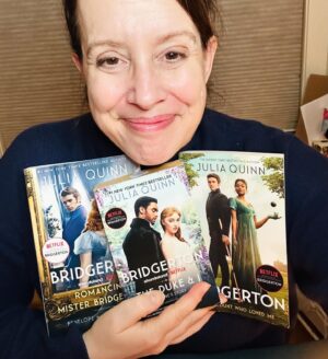 Julia Quinn Instagram - Girl with THREE #Bridgerton books/seasons.
