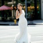 Juliana Harkavy Instagram - I had such a blast doing this photo shoot for @lilibridals 👰🏽‍♀️💐💍 Lili Bridals is near and dear to my heart, as it's where I found my own wedding dress. 🥰 I was quite nervous going into this shoot because my body has changed so much since doing 2 years of fertility treatments. 🪺💫 But Lisa was instantly confident we'd find a dress. The first one she picked out (pictured) made me feel so beautiful, voluptuous, and comfortable in my skin. All my worries faded away as I strutted down Ventura Blvd. in my gown. 💃🏽 Lili's carries styles for people of literally every shape and size. They make you feel at home, and deeply embodied inside the goddess queen you are. ✨👑✨ If you're a bride-to-be in the Los Angeles area, this is your spot. 🤍 #weddingdress #lilibridals #weddinggown #weddinggownshopping #sayyestothedress #weddinginspiration #weddingdressinspo #martinaliana #weddinggowninspiration #weddingdressshop #weddingdressdesigner #weddingphotography #weddingplanning #bride #bridetobe #weddingmotivation #weddingphotoideas #weddingshop #bridal #bridallook #bridalfashion #bridaljewelry #bridalcollection #bridalshoot #bridalstore #bridalcouture #weddingcouture #weddingstyle #weddingseason #losangeleswedding