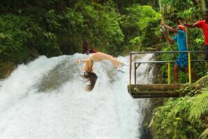 Kailia Posey Instagram - peace. love. respect. 
Jamaica📍🇯🇲
.
.
.
.
.
#jamaica #falls #cliff #daredevil #peace #love #respect #yamon🇯🇲 #mon #trees #waterfall #jump #onelove #igoyoufollow #justsendit