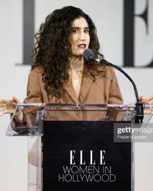 Kate Berlant Instagram - Thank you @elleusa for having me 🤎 Got to celebrate an outrageous group, including @oliviawilde 🤎 (makeup by @kirinstagram / hair by @frizzy.b / the vintage mugler suit is from my closet @muglerofficial hello are you listening? call me)