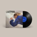 Katelyn Tarver Instagram - Doing a vvvv limited run of vinyl for my upcoming album Quitter, and it’s available to preorder now on my website!!! Go get one before they’re gonnnne! Also the Quitter pullover is finally up for purchase! It’s Quitter season babbyyyy Album photos by @iridamete and vinyl design by @theblksmith. Both geniuses 🙏🏻