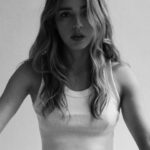 Katelyn Tarver Instagram - Has anyone or anything put in as much work over the years as my cropped white brandy melville tank? My one true constant 💘