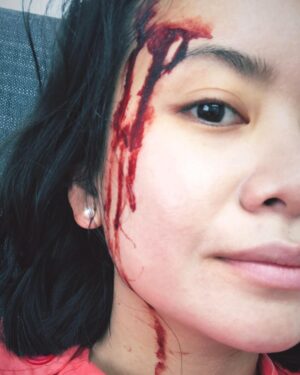 Katie Leung Instagram - Chillin’ on the set of Chimerica. Heh 🥶👻 #channel4 #glamandgore #donttrythisathome
