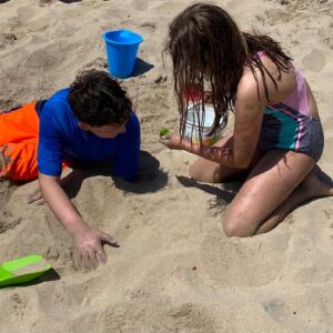Katie Porter Instagram - We had our first family beach egg hunt today. For those inspired to try this for themselves, I have some tips! 🤓 #easter 

1. No chocolate because it melts. This one I knew! Jelly beans are easy to clean sand from, just in case. As my son Paul pointed out, so are dollar bills 😳😂

2. Make sure your eggs don’t have holes. Close tightly.

3. Count eggs before burying so you leave no plastic behind.

4. Don’t get too ambitious. Sand is sneaky! I dug deep holes and got a blister, but these are some tired kids.

5. Save some special candy treats that kids can earn for trading in garbage they find while searching for eggs.