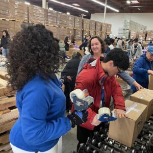 Katie Porter Instagram - Martin Luther King, Jr., Day is supposed to be "a day on—not a day off." This morning, I joined @cap_oc and @100blackmenoc to help assemble food boxes for the Orange County community. Today and every day, it's on all of us to spread kindness and stand up to hate. #MLKDay