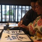 Katrina Bowden Instagram - Such a special experience in a historic Kyoto townhouse that is over 100 years old. Wearing kimono during a matcha tea ceremony followed by a lesson in calligraphy is something I will never forget ❤️🇯🇵 @orizuruya_kyoto