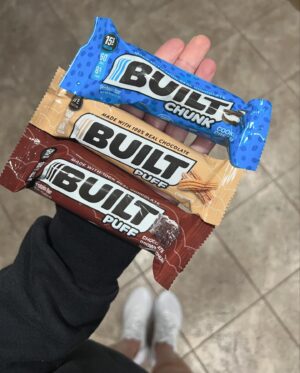 Kaytlin Neil Instagram - My weight cut go-to’s 👊🏻 #mmafighter 

1. @builtbar puffs are 15g of protein and taste SO good melted in the microwave for 10 seconds.

2. @oatsovernight are 10-20g protein and so easy to make and have on hand.

3. @kudosnacks protein popcorn is for when I’m feeling more savory and packs 10g of protein per bag. 

4. @smartsweets has lots of fiber and really helps when I’m craving candy!

5. @chomps beef sticks are 10g of protein and have zero sugar.

6. @totofoodsco are 10g of protein per cookie and SO good! I love that they’re a little gooey on the inside. 🥹

#healthysnacks #fatloss #proteinsnacks #protein #snackideas