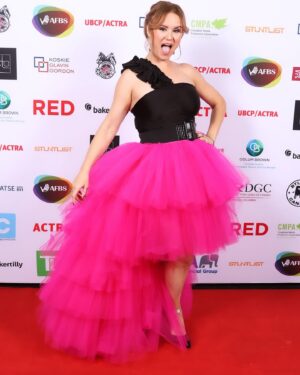 Keegan Connor Tracy Instagram - Finally managing to post red carpet pics from the @ubcp_actra awards! I can’t help it, this pink skirt just brings me joy. And I love the picture that sneak pic of me speaking to @iamkyleguerrero and Louis Wei about our recent film @theworstdayeverfilm which I directed. Such a fantastic night celebrating the fabulous talent in this city. 
#yvrshoots #ubcpactraawards #nominee #gala #pinkdress #pink #champagne #actorslife #awards #actress #director #femalefilmmakers @katehewko #katehewko