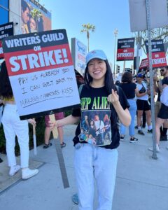 Keiko Agena Instagram - Pic by @alexsongxia! Thanks novelist Elaine Hsieh Chou for repping a #HepAlien shirt on the picket lines today. (I’ve never seen that one 💕) If you LOVE words you’re probably a fan of #GilmoreGirls. (We had all the best words.) Support the WGA so that all the words you love can continue to be written. Thanks Alex and Terry for also being out there on the picket lines. #WGAstrong #sagaftramember #1u
