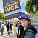 Keiko Agena Instagram - Out at the picket line today at Universal Studio. Wish we could credit the writer that wrote that sign! So many great signs out at the picket line today. @shinkawasaki and I support the writers. Fair Wage. Union Strong. #WGAstrong, #sagaftramember and #1u