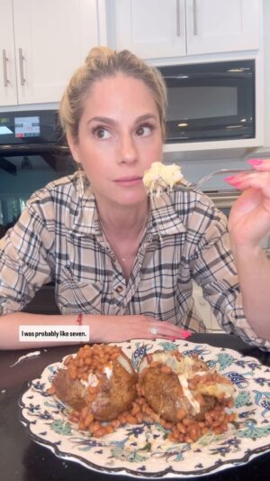 Kelly Kruger Instagram - Wow these are legit 12/10!! 
 
Have you ever had a jacket potato?? 🥔 

You can also customize it however you want, I added chicken for added protein but you can add any meat or leave it out 

I airfried my potatoes at 450 for about 40 minutes (using @breville smart oven, not sure with regular air fryers what time and temp would be) 

No measurements necessary just load up your potatoes with :
Butter 
Cheese 
Protein of choice (I used leftover rotisserie chicken) 
Baked beans 
Salt / pepper to taste. 

Comment Yes Please if you would eat this!! 

#potatoes #jacketpotato #britishfood #comfortfood #viralrecipes #eeeeeats #feedfeed #yum #easymeals #britain #foodporn #beans