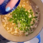 Kelly Kruger Instagram - I can’t believe I’ve never had this before!!! Well I guess I can, most Mapu Tofu is made with pork and I don’t eat pork but I made it with ground turkey and this was chefs kiss!!!! 💋 👩🏻‍🍳 SOOOO GOOD!!!! I had it with rice for dinner and the next day over kelp noodles for lunch and I’m salivating right now even writing about it. As always, gluten free with no refined sugar. Have u tried this dish or made it? Would you? What’s your favorite type of cuisine? Here’s how to make it: - 1 block (14 oz) firm tofu, cut into small cubes - 1/2 lb ground turkey - 1 tablespoon fresh ginger, minced - 3 cloves garlic, minced - 2 tablespoons miso paste I used half cup - 2 tablespoons soy sauce - 1 tablespoon maple syrup - 3-4 green onions, chopped (for garnish) - 2 tablespoons olive oil or avocado oil for cooking Instructions: 1. Heat the olive oil or avocado oil in a large skillet or wok over medium heat. 2. Add the ground turkey to the skillet and cook until browned, breaking it apart with a spoon as it cooks. 3. Once the turkey is cooked, add the minced ginger and garlic to the skillet and cook for about 1 minute, until fragrant. 4. Add the miso paste, soy sauce, and maple syrup to a bowl and stir together then add it to combine with the turkey, ginger, and garlic. 5. Carefully add the cubed tofu to the skillet and gently stir to combine with the turkey mixture, being careful not to break the tofu cubes. 6. Let the Mapo Tofu simmer for about 5-7 minutes, allowing the flavors to meld and the tofu to heat through. 7. Once the dish is ready, garnish with chopped green onions. 8. Serve the Mapo Tofu hot over steamed rice or with kelp noodles for a gluten-free option. #recipeshare #tofu #glutenfree #refinedsugarfree #easyrecipes