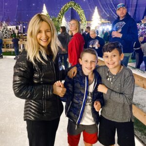Kelly Preston Instagram - Ice skating at Enchant Christmas Village in St Pete... ♥️ this photo was the extent of my ice-skating last night though… I thought I was a pretty good skater. Was sadly mistaken. I walked out,  four steps on the ice and almost killed myself and decided this photo was enough LOL (to be fair, the Zamboni had just turned it into an ice slick and people were flying everywhere 🤣)