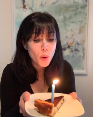 Kestie Morassi Instagram - Isolation birthday this year.
Day 3 of 14. But what a day it’s been already. Music was played, living room boogies were had, deliveries of flowers, coffee and cake were dropped at my door, rubbish was generously taken out for me coz my bins are literally in another suburb, FaceTimes were happening, texts were pinging, online birthday purchase codes were redeemed and the best bit is, I didn’t have to wear a bra for any of it.
This self portrait was taken when I had just tried to make a birthday wish but realised I actually have everything I could ever want right now...except more cake...so I might UberEats it.