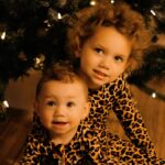 Kiely Williams Instagram - My life’s work, in human and art form. (Pic from last Christmas) My babies in Cheetah. Our wedding anniversary is coming up this weekend, and did you know I met my husband on a Cheetah Girls Tour? Crazy. I wouldn’t have anything if it weren’t for TCG. So, hug your babies and your partners, be grateful for the triumphs and the tears and 🎵 Have Yourself A Very Merry…🎵