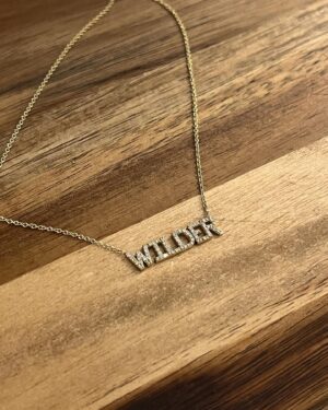 Kimberly Daugherty Instagram - Obsessed with my new “WILDER” necklace from @shopbabygold! Thank you so much! #gifted