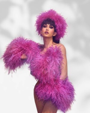 Kimmy Couture Instagram - 🩷 Pink and Dreamy 🩷

.
.
👗 Dress by: ME
🪶 Ostrich Feathers by: Mother @itsqueenicesis 
📸 Photos by: @cloudy_creator