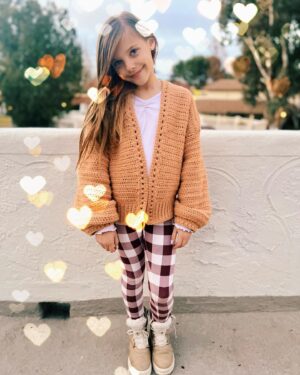 Kirsten Storms Instagram - You’d think she’d be tired of me making her sweaters by now. Fortunately, for me and my yarn stash, she is not. 🙆🏼‍♀️

Yarn: Pound of Love in “Pumpkin Pie” by @lionbrandyarn. 
No pattern used. 
As I told @emmerylan “I winged it!” 🤘🏼
#lionbrandyarn #crochetersofinstagram