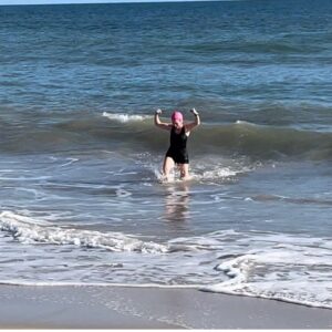 Kitty Flanagan Instagram - Today’s bracing dip at West Beach. Thankyou Adelaide! Last chance to vote for Fisk to win a Logie - if we don’t win, I’m going to frighten the children and do my next swim in the nude. Vote now and save the children. #winterwarriors
