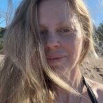 Kristin Bauer Instagram - Morning beach yoga class. I am hesitant to post my Yoga retreat in Costa Rica as it feels frivolous, but this isn’t how my life always is. And also if it could be or was - or is for anyone who lives in this Eden full time - Good for you! Because there is suffering in the world and frankly, so many wrongs and horrors, and it serves no one for all of us to, as witnesses to the evils, who can’t control it, to also suffer. For most of my life I’ve felt I needed to suffer with my loved ones who were suffering to stay connected to them and I worried that if they weren’t ok, I wouldn’t be. But new chapter so I’m having a glorious week. I’ve dreamed of coming here for so long. And here I am and here it is. 🤷‍♀️ #costarica #yogaretreat