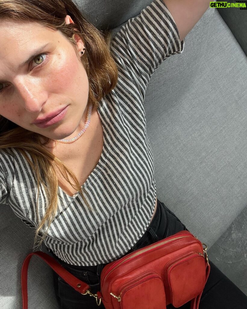 Lake Bell Instagram - The least I can do is find my light. Top&bag @marlowgoodskate