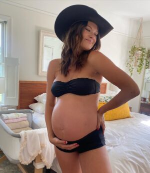 Laura James Instagram - officially full term & still loving every second of this 🥲

ty @corajane for capturing 🫶🏻