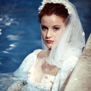 Laura Leighton Instagram - #throwbackthursday circa 1994, from a scene on #MelrosePlace, in which I end up in the pool in a wedding dress.  Not pictured:  @josiebissett, who flung me in, and the white pumps, which stayed on my feet the whole time.  #sydney  #sisters