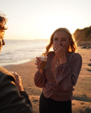 Laura Leighton Instagram - I AM SO EXCITED to share this news!  Our daughter Maddie is ENGAGED! 🍾Her fiancé, Connor, planned a beautiful surprise proposal and I have never seen Maddie happier!! 💗💗
I guess this means I will be a M.O.B. ForReal? 😬😬Um, anyone have any wedding planning tips...? .
📷: @travywild .
.
.
#planningawedding  #weddingwisdom