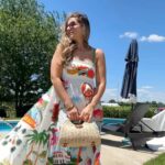 Laura Vitale Instagram - Had to share this 20$ dress because it didn’t feel right keeping it to myself!! Comment DRESS (no other character after) if you want and I’ll send you the link directly and I’m also linking my 15$ Valentino doopssss along with the BEST summer wedges and everything else in this clip. For real, the vacation dress of the summer😍